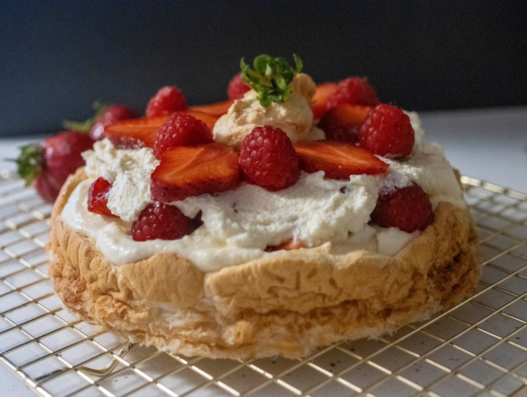 photo of a Pavlova cake - meringue cream and berries